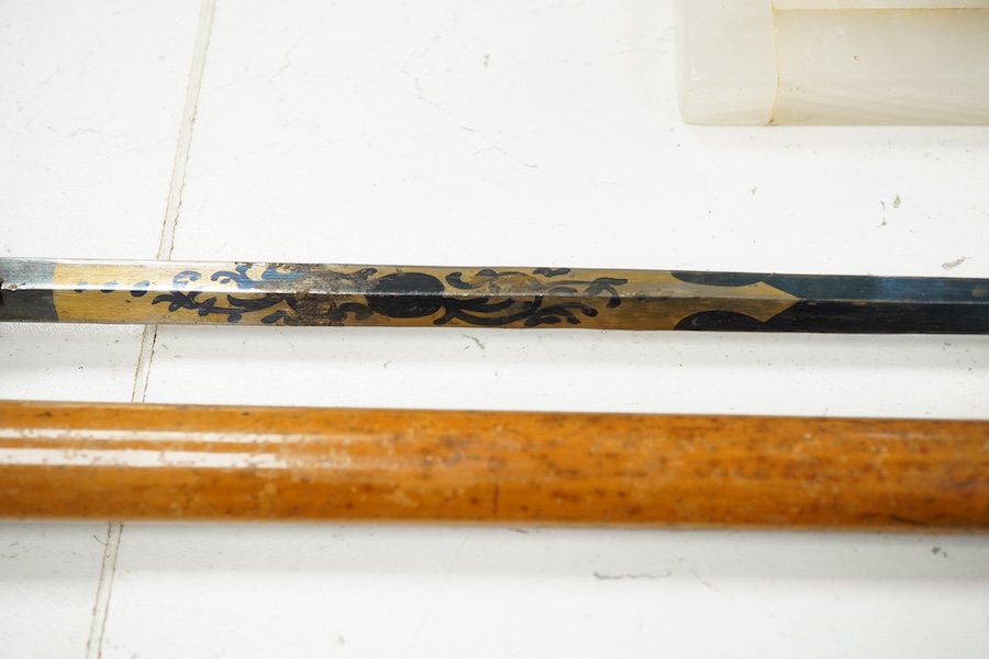A Victorian silver mounted sword stick, with damascene blade, 90cm in length